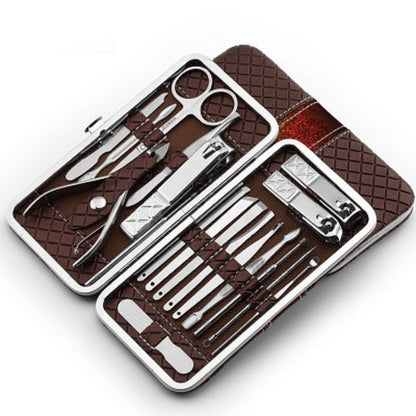 Nail clipper set travel grooming kit with brown hard case and stainless tools, open