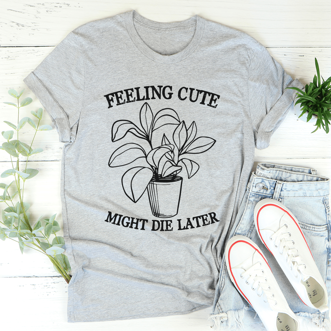 Gray T-shirt, crewneck fit, featuring potted plant line art with FEELING CUTE and MIGHT DIE LATER