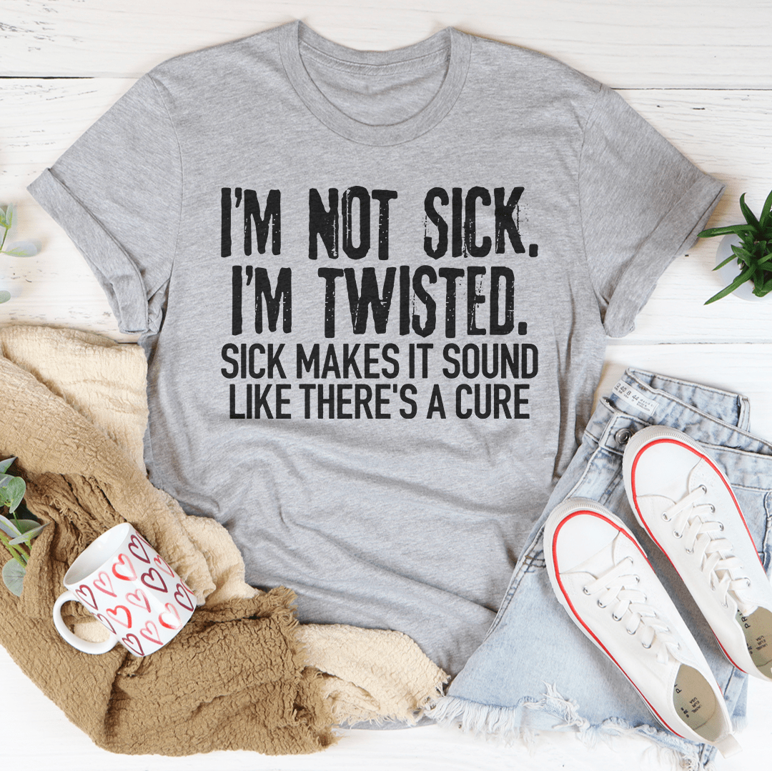 Heather gray crew-neck T-shirt with bold text graphic: "I'm Not Sick" "I'm Twisted"