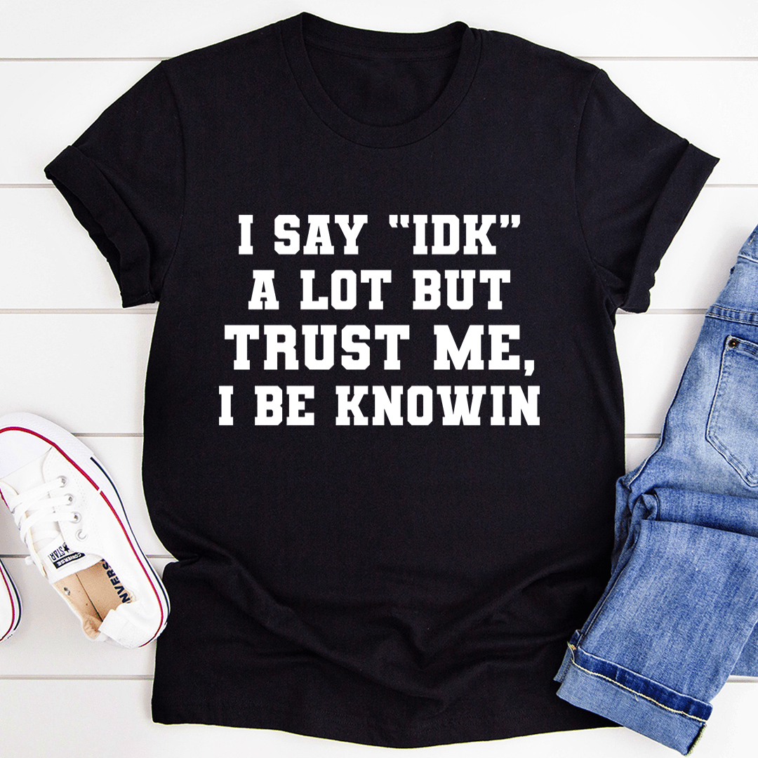 Black crewneck t-shirt with white quote "I SAY \"IDK\"" graphic