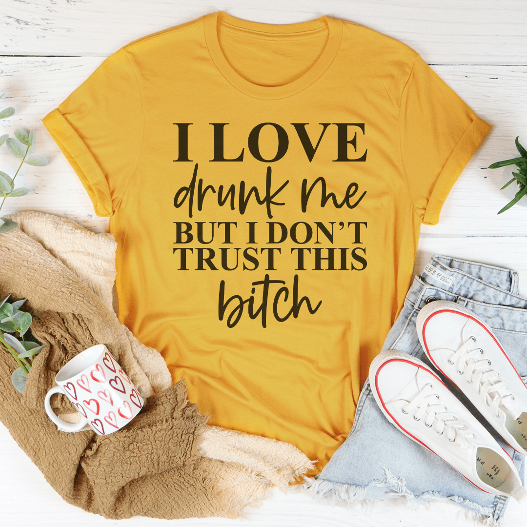 Mustard short-sleeve crewneck graphic T-shirt with bold 'I LOVE' and 'bitch' script