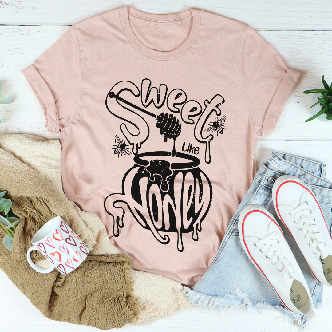 Mauve T-shirt with crew neck and black honey-themed graphic print
