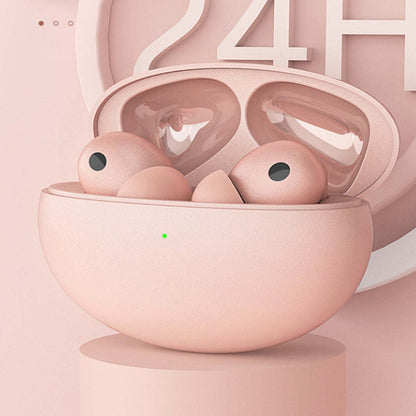 Pink wireless earbuds seated in a charging case with open lid
