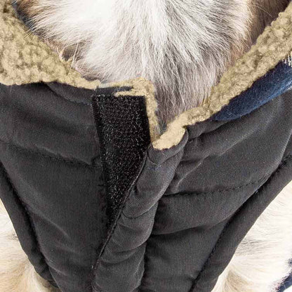 Dog insulated coat jacket chest close-up with dark quilted fabric and fleece trim
