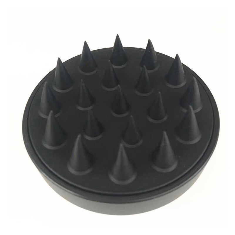 Black silicone scalp massage brush base with raised massage nubs