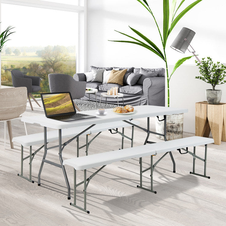 White folding camping table with gray metal frame and two folding bench seats