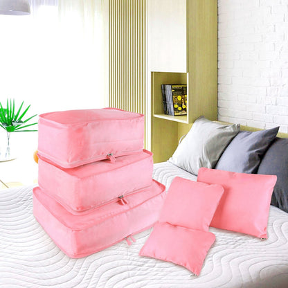 Pink water-resistant packing cube set with storage pillows and zip pouches