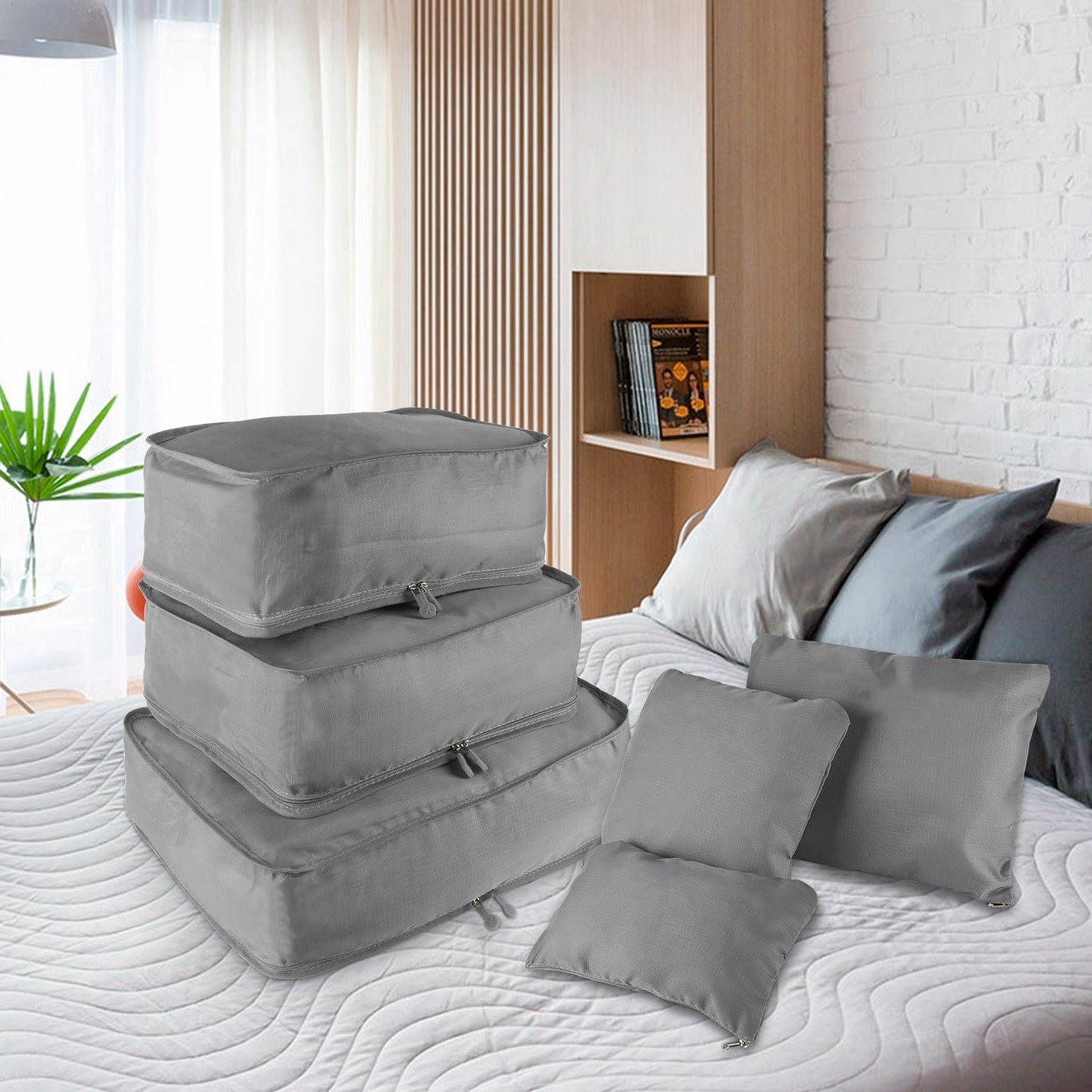 Gray storage cubes set with round top bag and zip compartments for travel