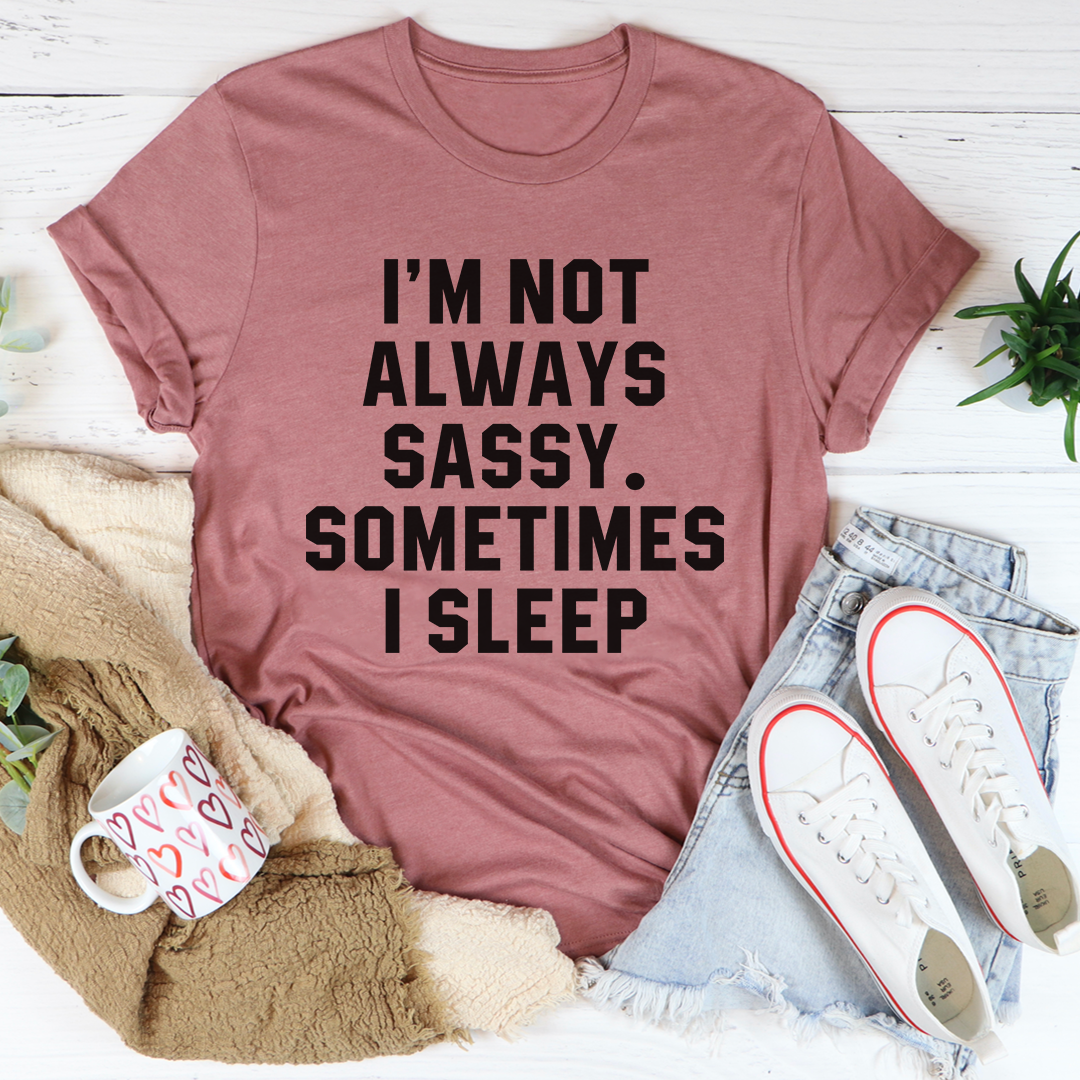 Mauve crewneck T-shirt featuring black lettering: I'm not always sassy. Sometimes I sleep
