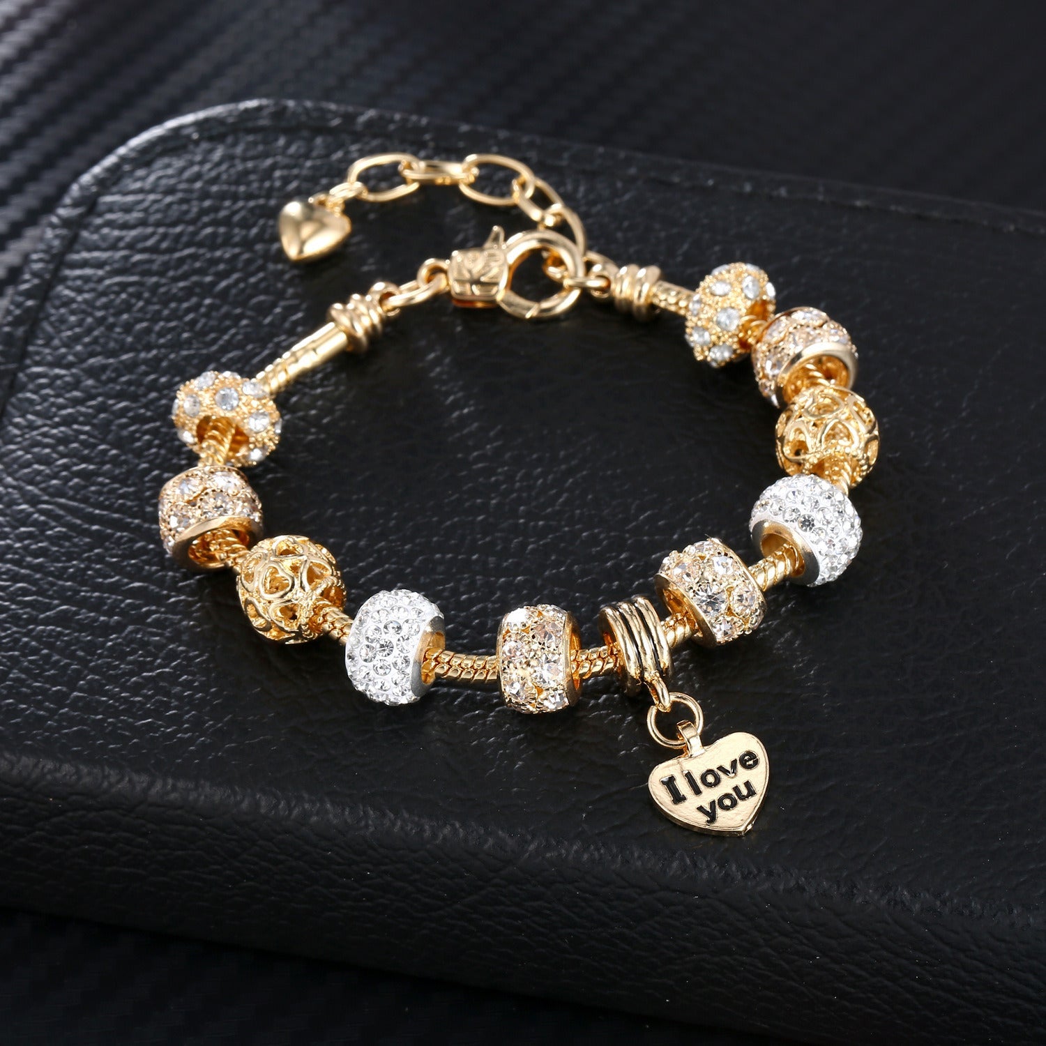 Gold plated heart charm bracelet with crystal bead charms and I love you heart pendant