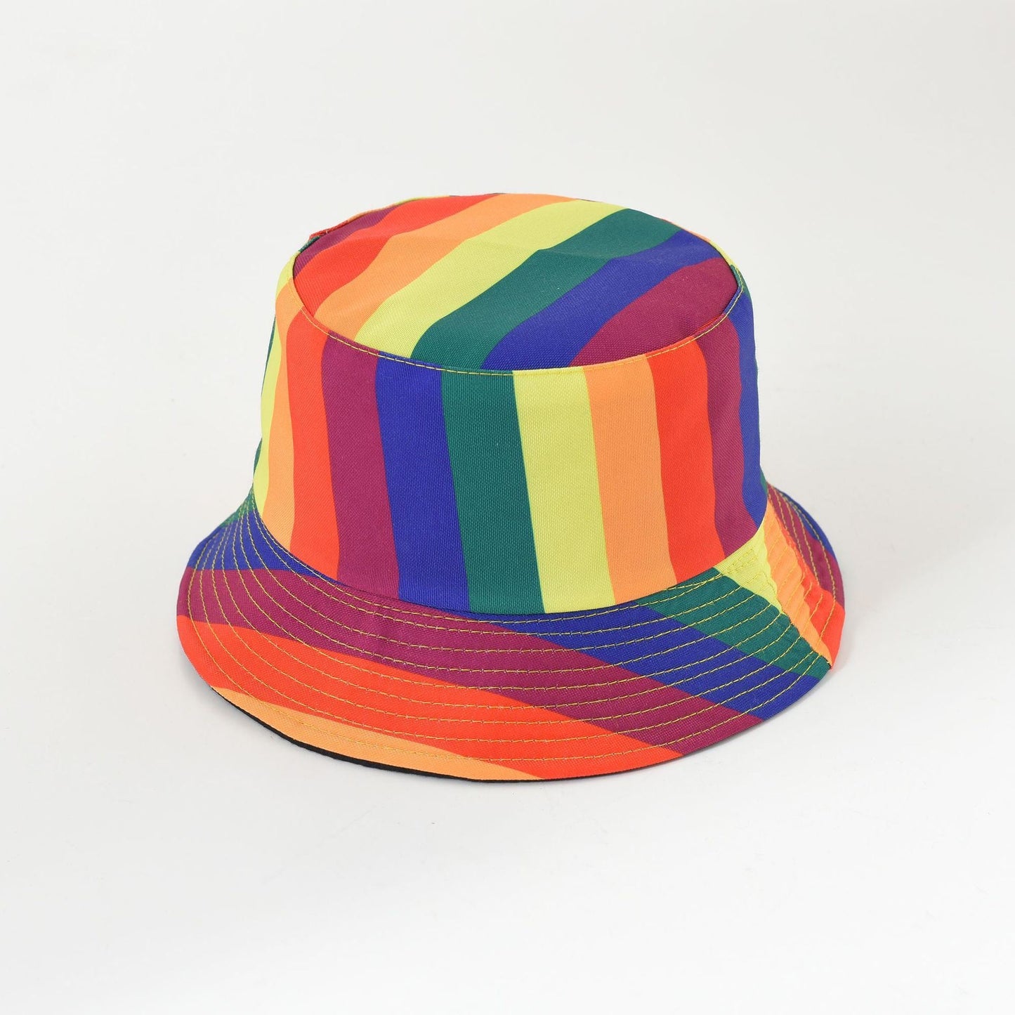 Double-sided bucket hat with rainbow vertical stripes on top and multicolor brim