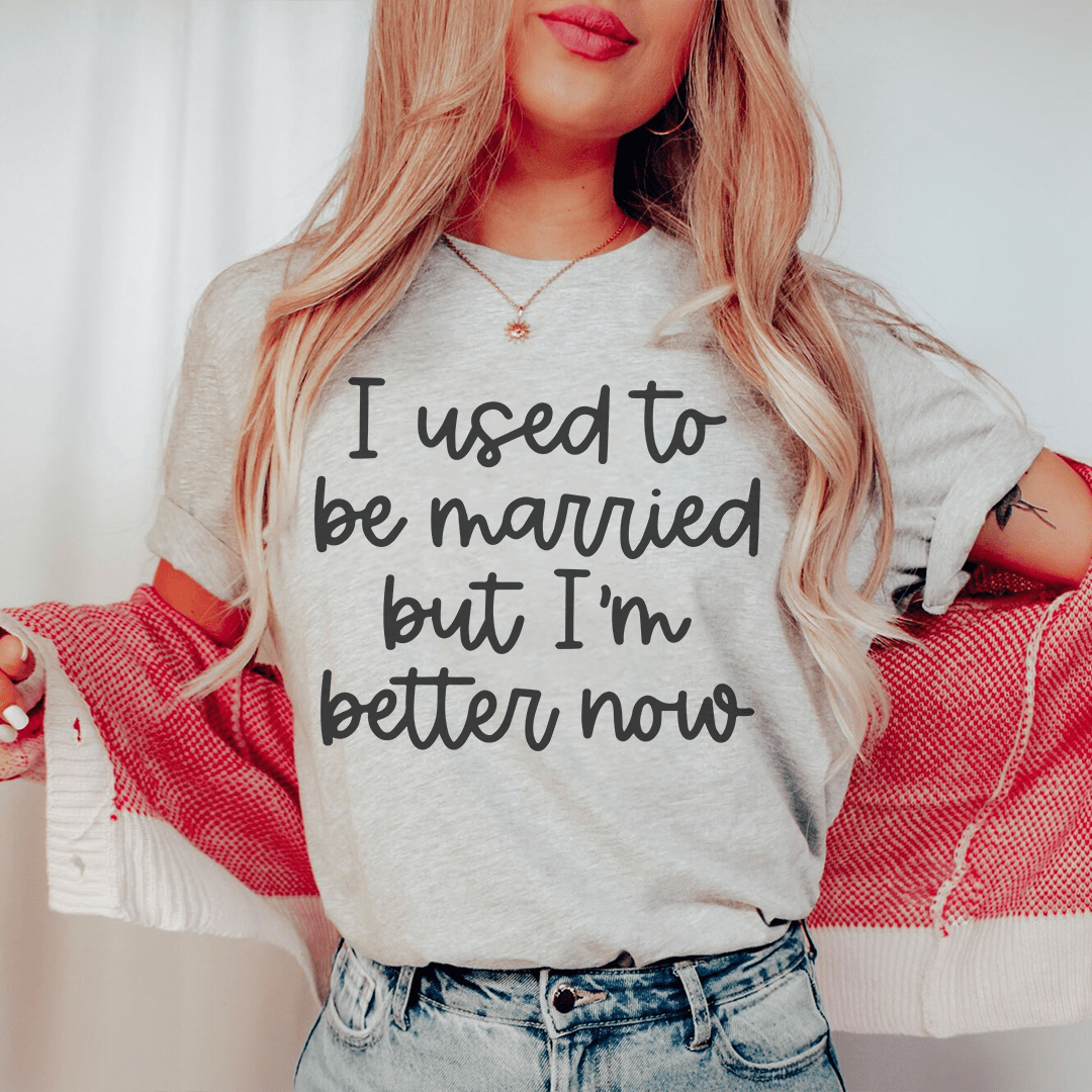 Heather gray graphic T-shirt with black hand-lettered text: I used to be married, better now.