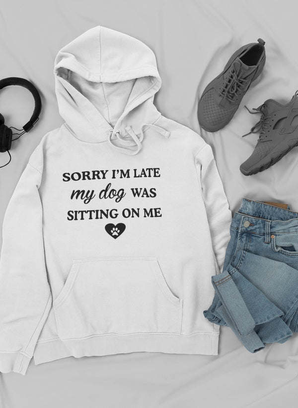 White hoodie with kangaroo pocket, drawstring hood, and dog slogan graphic