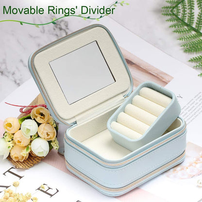 Light blue jewelry case open with inner ring divider and compartment for small jewelry