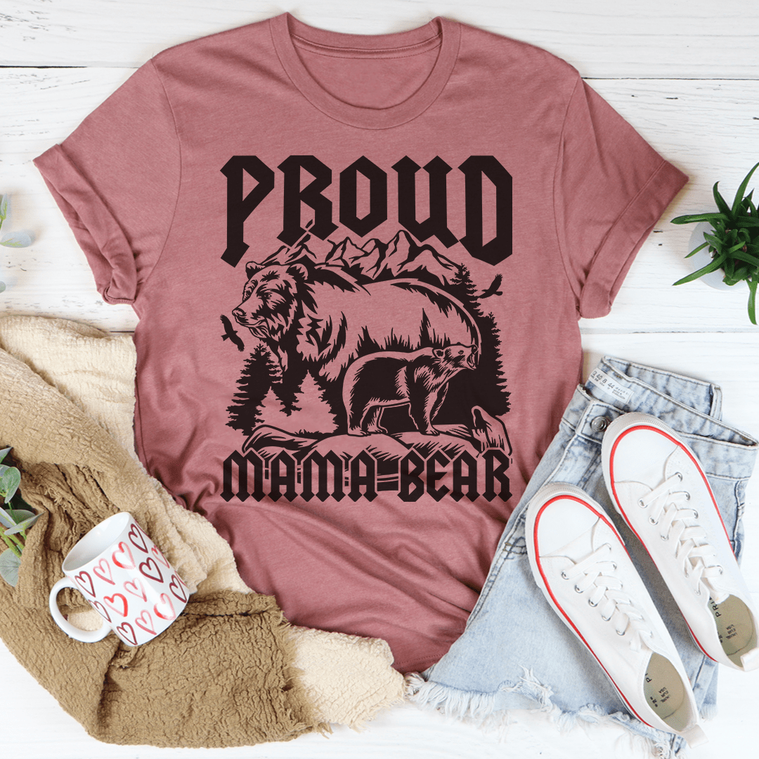 Mauve Proud bear graphic T-shirt with bold text and mountain illustration