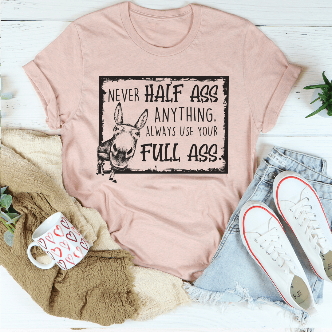 Light pink crewneck T-shirt with front graphic print of a dog and slogan text.
