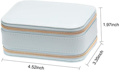 Light blue jewelry case with double zippers and gold-tone zipper trim