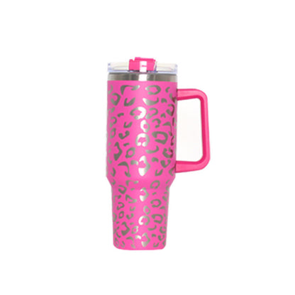 Pink leopard vacuum tumbler with handle, clear lid, and drinking straw