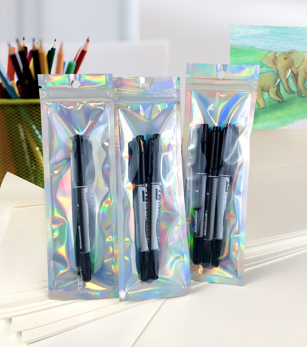 Holographic foil resealable pouch bags upright, contents visible through clear panels