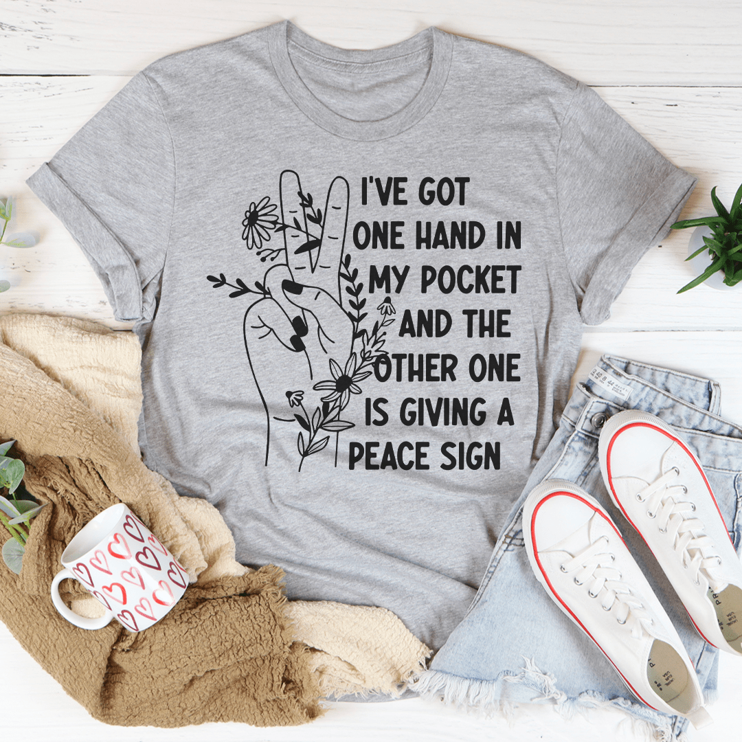 Gray graphic T-shirt with slogan “one hand in my pocket” and peace sign artwork