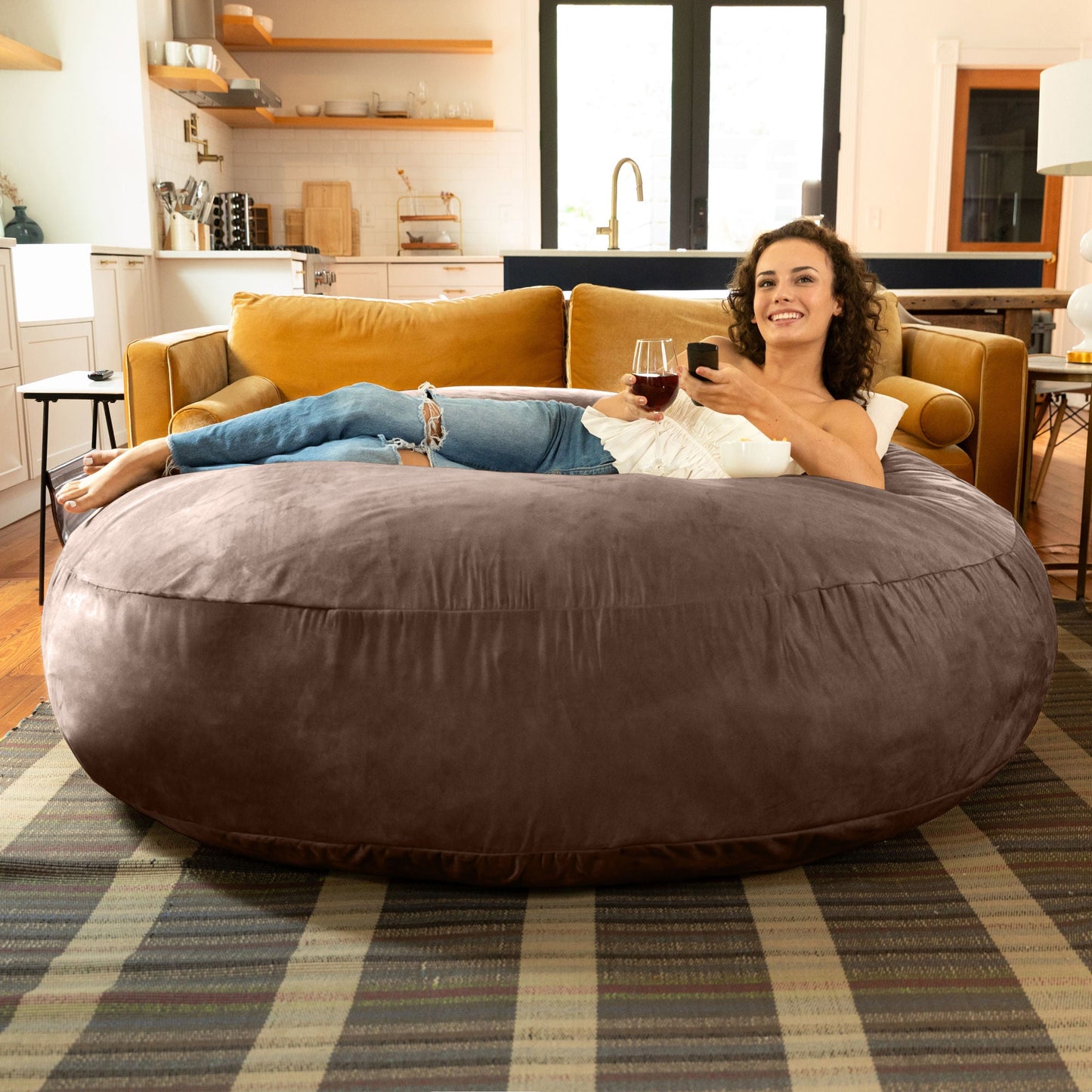 Large cocoon bean bag chair in dark brown microsuede with rounded sides