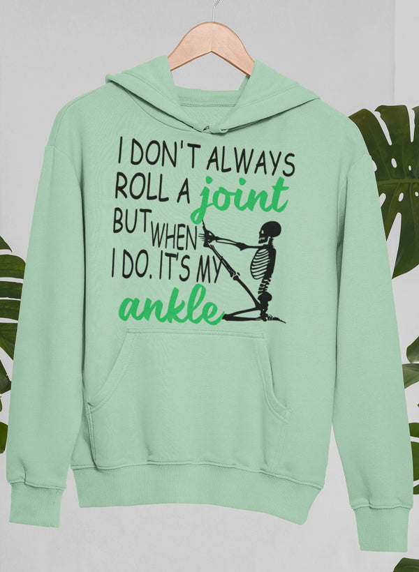 Mint green hoodie with kangaroo pocket, skeleton skull graphic and text print.