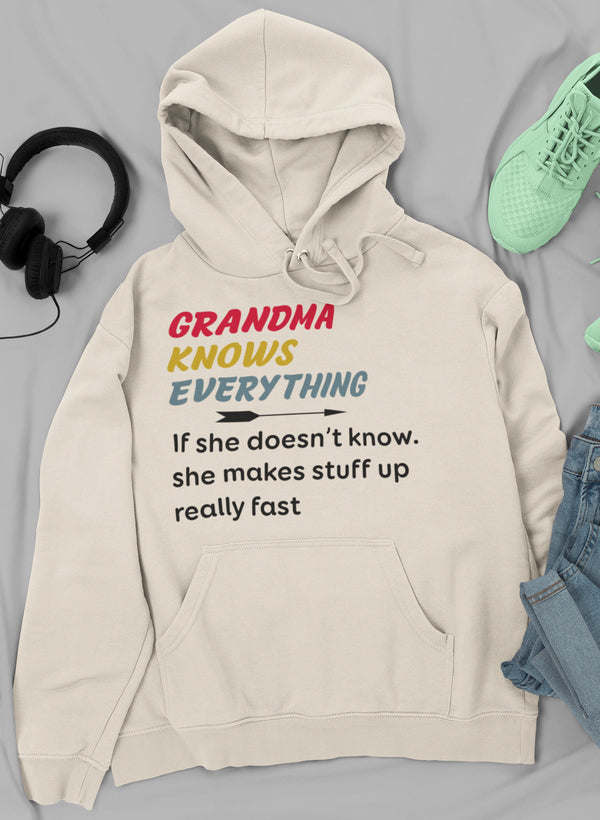 White hoodie with “Grandma Knows Everything” front graphic, hood, and kangaroo pocket