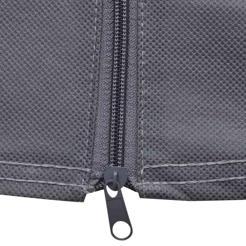 Dark gray caravan cover zipper with metal pull tab close-up