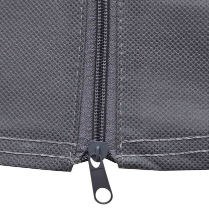 Dark gray caravan cover zipper with metal pull tab close-up