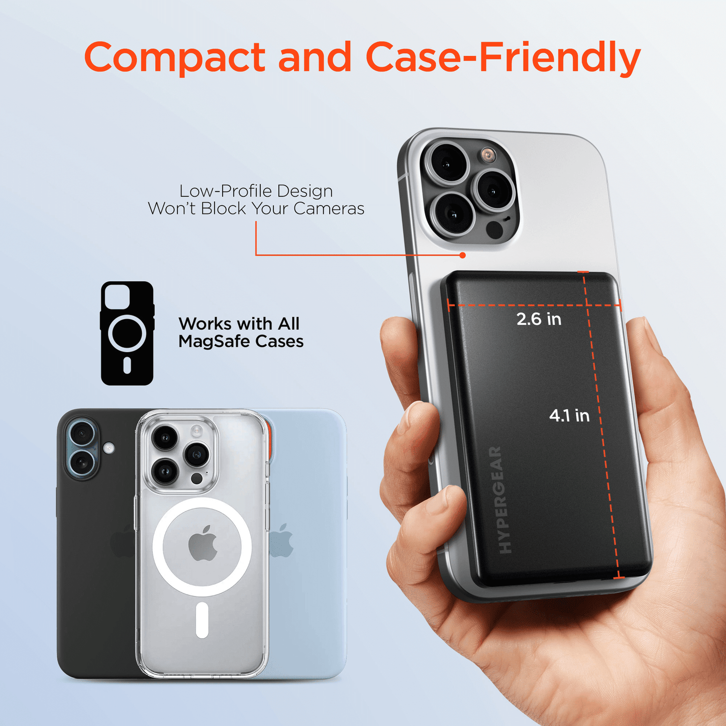 Black slim magnetic power bank held in hand beside a smartphone