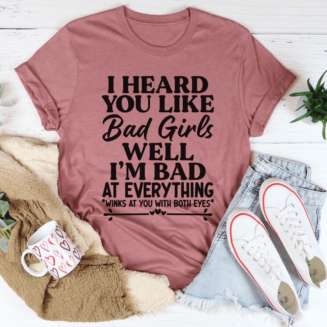 Mauve crewneck T-shirt with slogan graphic reading “I HEARD YOU LIKE Bad Girls”