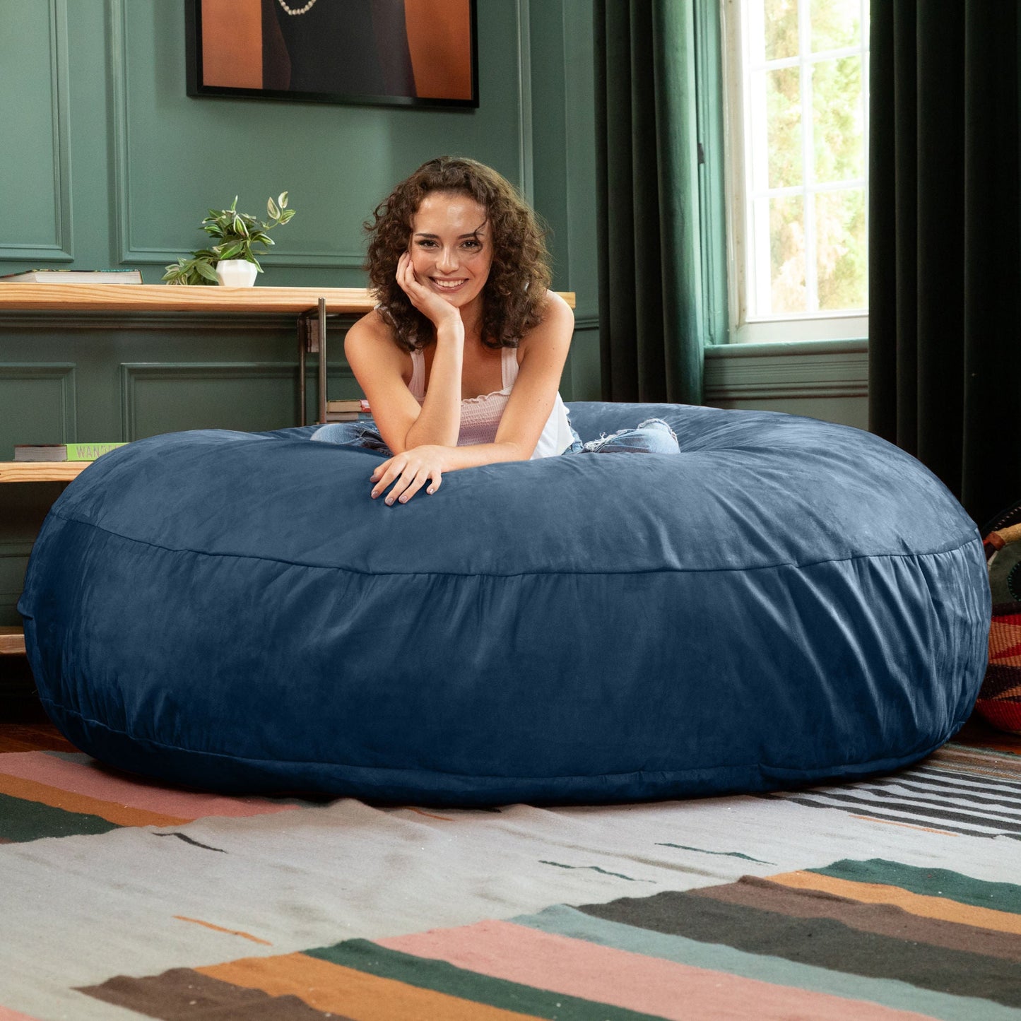 Navy microsuede cocoon bean bag chair with wide oval shape for lounging