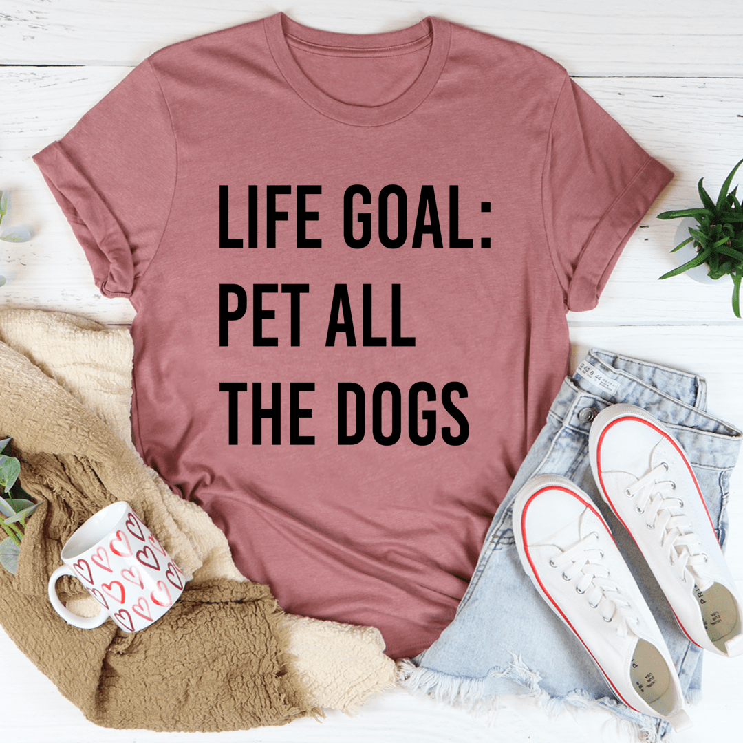 Mauve graphic T-shirt featuring bold text "LIFE GOAL: PET ALL THE DOGS" on front