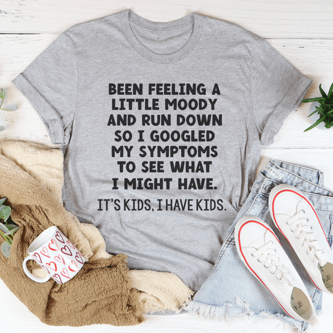 Heather gray graphic T-shirt with centered black slogan text: "Been feeling a little moody".