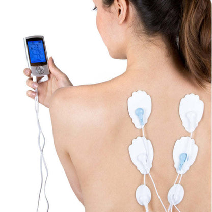 Sore No More relaxer on-skin electrode pads on back with device held nearby