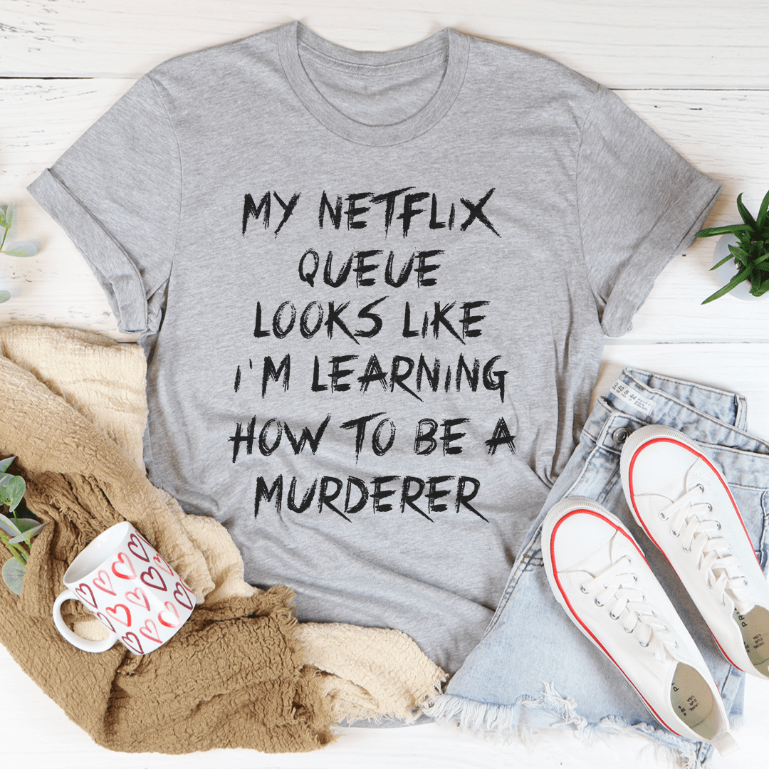 Gray T-shirt with black 'My Netflix Queue' quote graphic