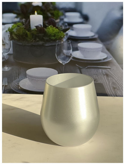 Metallic gold plastic wine glass, stemless goblet with wide rounded bowl