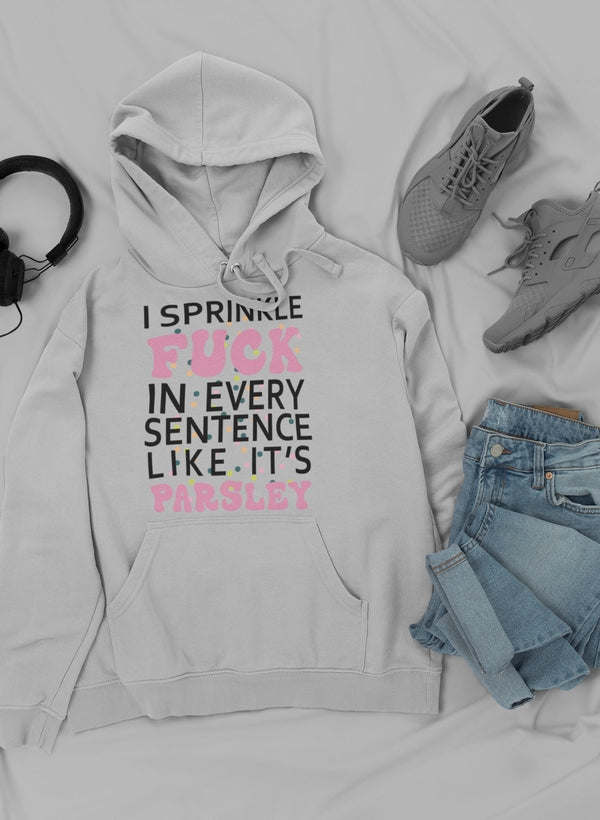 Cream-white pullover hoodie with hood, drawstrings, and front text slogan graphic