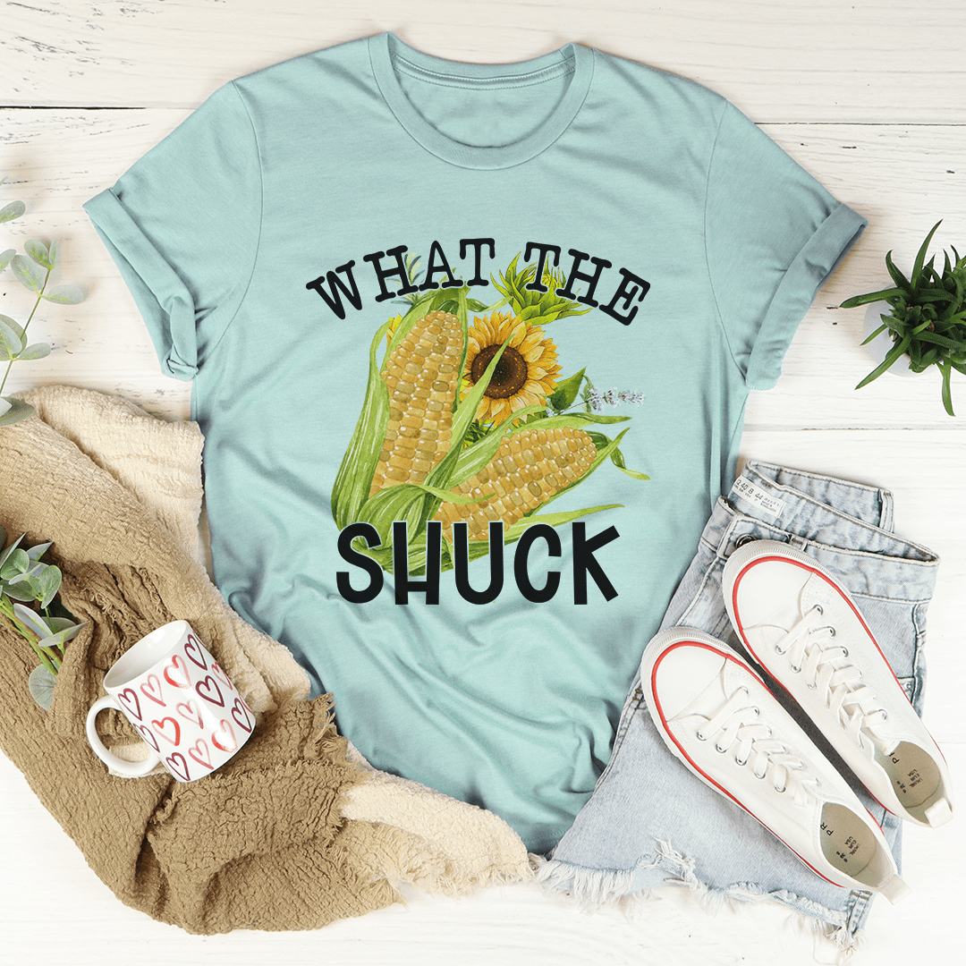 Teal T-shirt with corn graphic and text "What the Shuck"