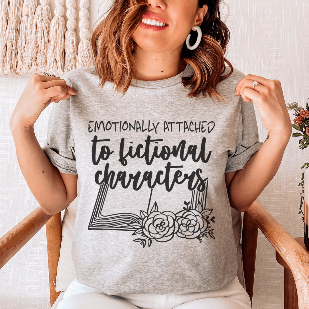 Grey heather T-shirt worn by model with black typographic quote and floral graphic