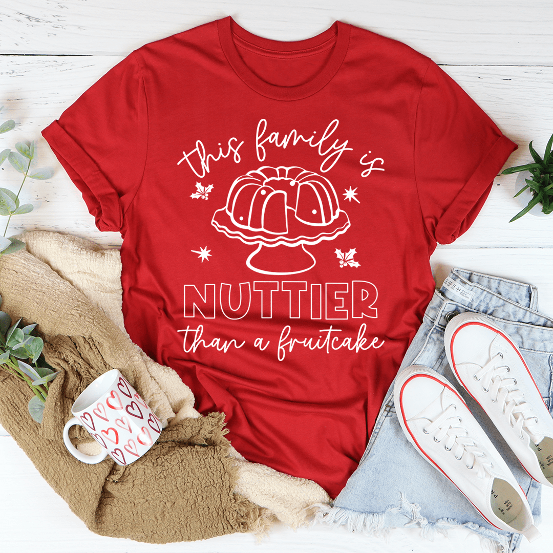 Red T-shirt with 'NUTTIER than a fruitcake' graphic