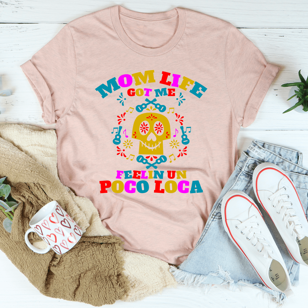 Heather pink graphic crewneck T-shirt with colorful taco-style text and skull graphic