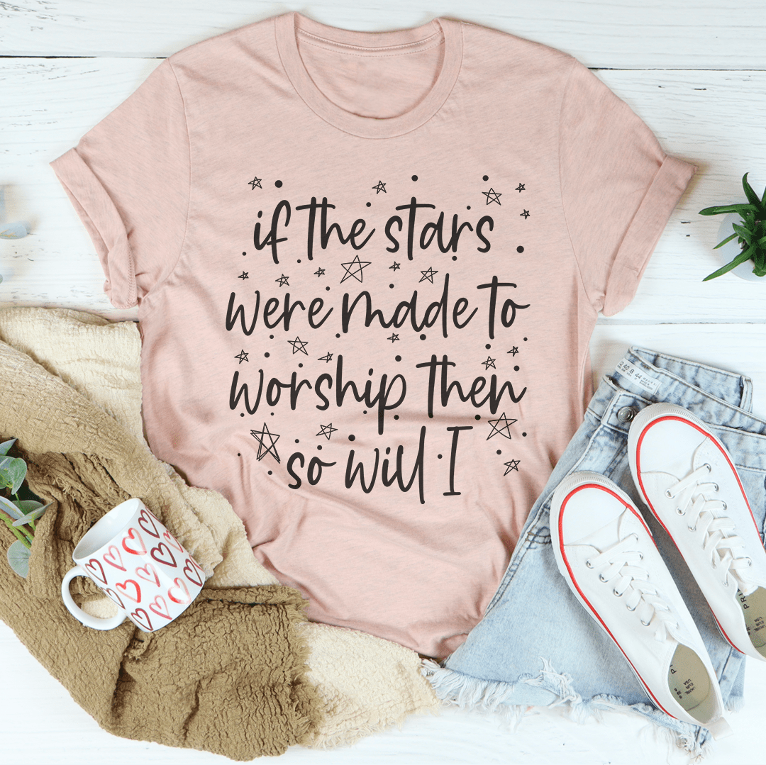 Blush pink crewneck T-shirt with centered starry lettering and symbols.