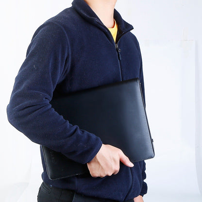 Dark gray 9.7in tablet portfolio with folio cover, held by hand