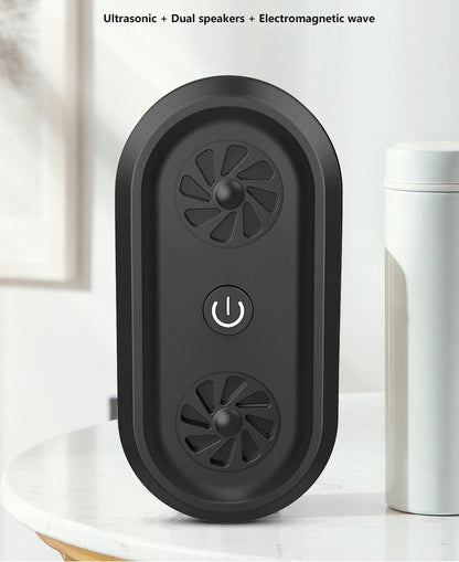 Black ultrasonic pest repellent unit front view with dual speaker grilles and power icon
