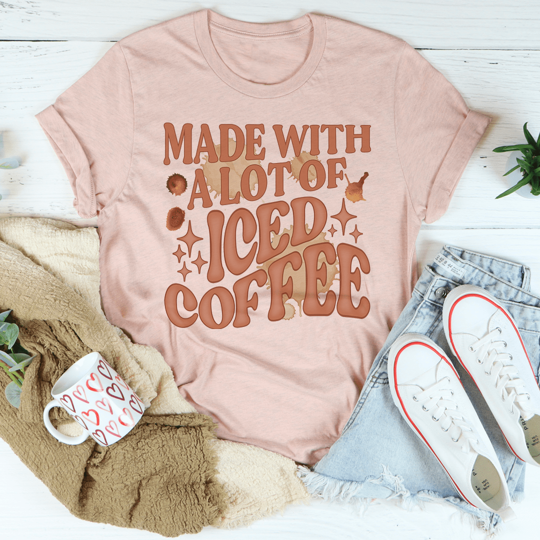 Heather peach T-shirt with 'MADE WITH A LOT OF ICED COFFEE' chest graphic.