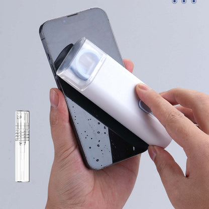 7-in-1 cleaning gadget held to a smartphone screen with a white nozzle