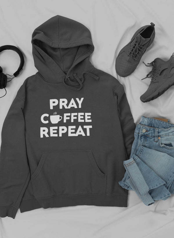 Dark charcoal pullover hoodie with "PRAY COFFEE REPEAT" front graphic