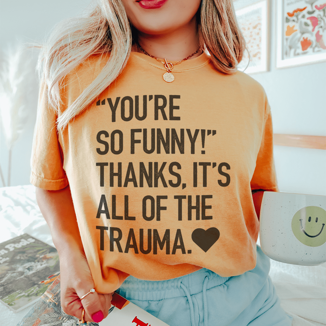 Graphic T-shirt, peach, crew neck, bold quote print with heart symbol.