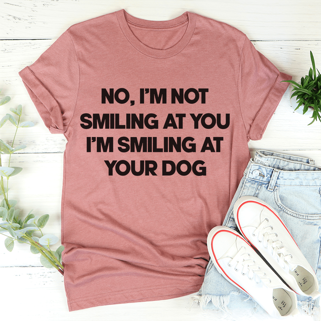 Mauve T-shirt with bold black dog slogan graphic on the chest